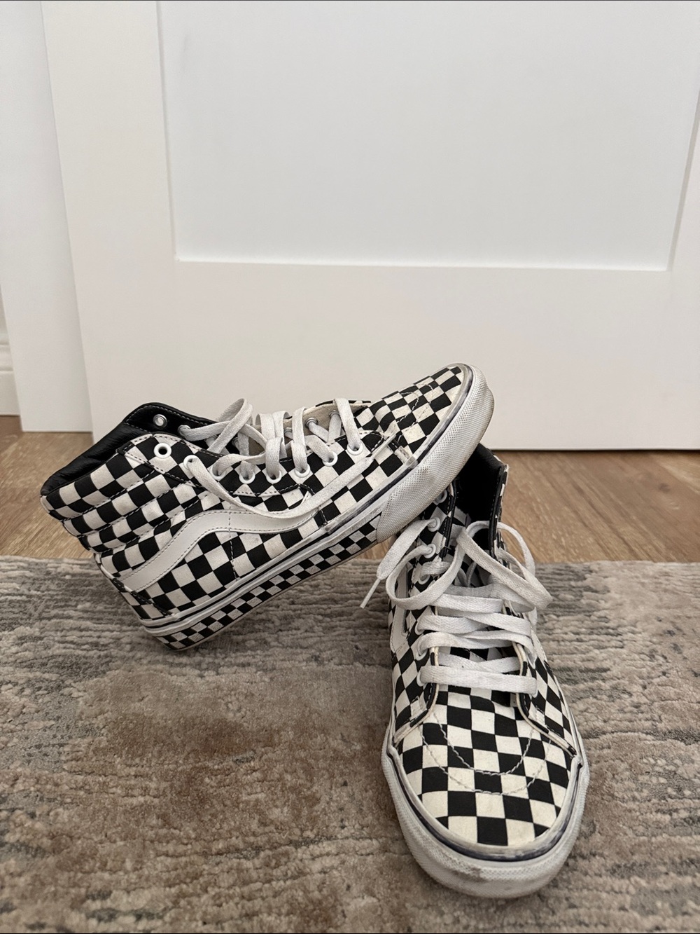 Vans Black and White Checkerboard High-Top Sneakers